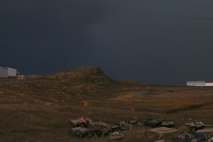 The darkened sky of the thunderstorm presents the closest thing to 'night' in Kugluktuk. (Photo credit: John Kelly)