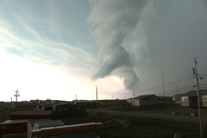 The front of the storm rolls over town. According to locals, storms like this have become more frequent in the past several years. (Photo credit: John Kelly)