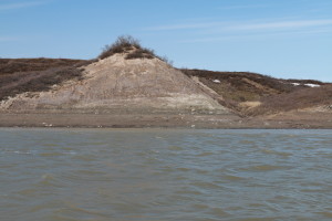 The water line from just a few days earlier is visible on the side of the hill. The water level was almost ten feet above its current height. (Photo credit: John Kelly)